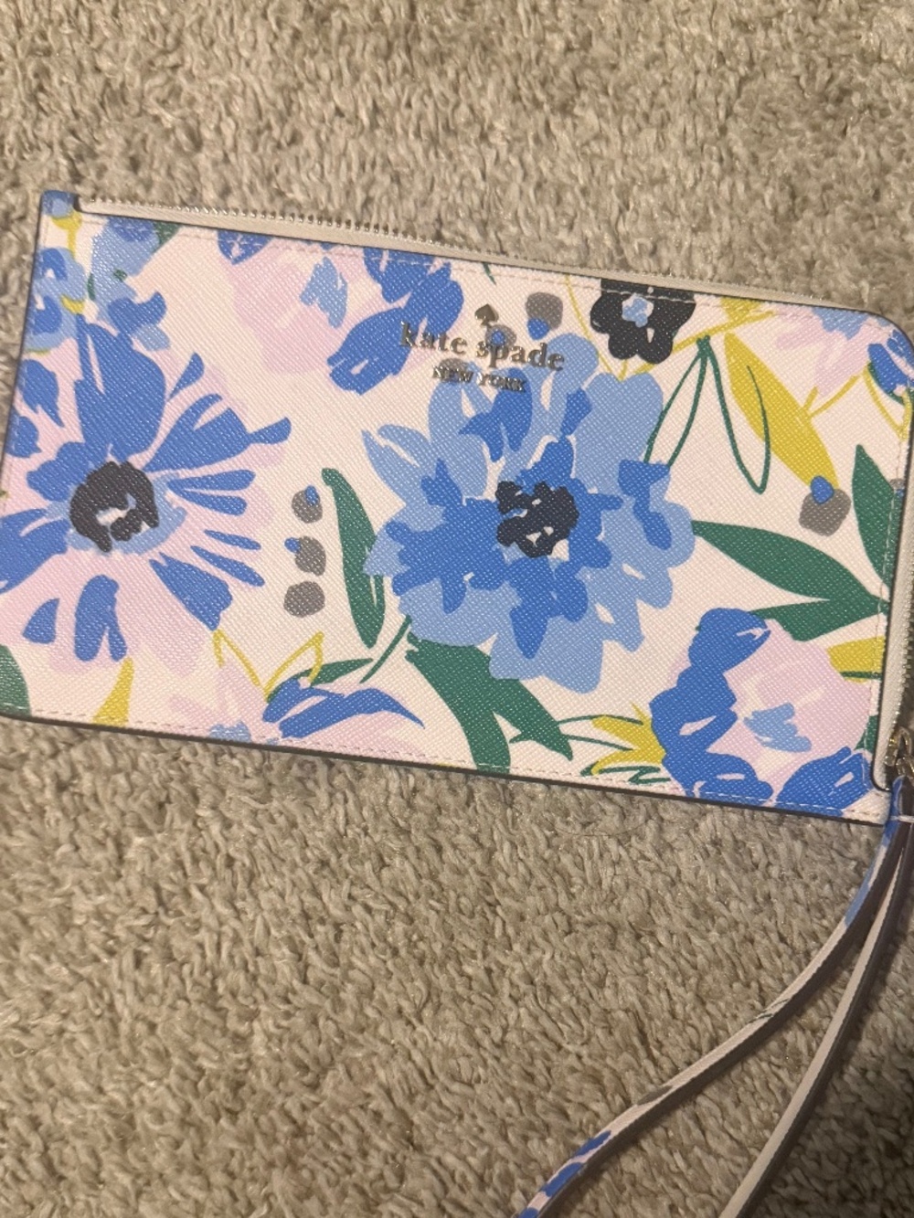 Kate Spade floral zip wristlet — authentic, gently used.